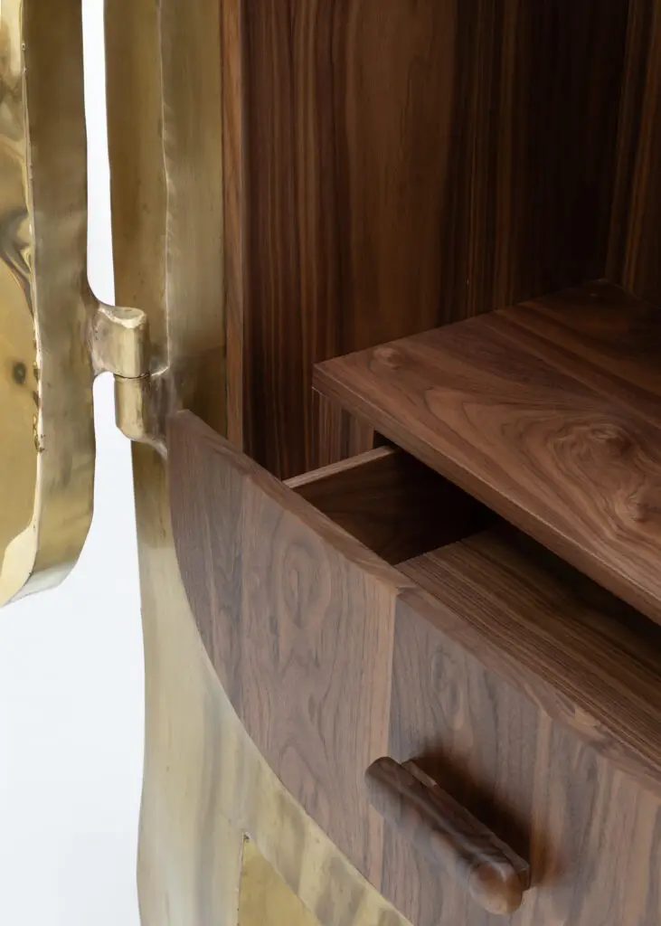 Detail of Drinking Cabinet by Nick Valentijn with hand-formed brass exterior and walnut interior, presented by ST. VINCENTS at PAD Paris 2026